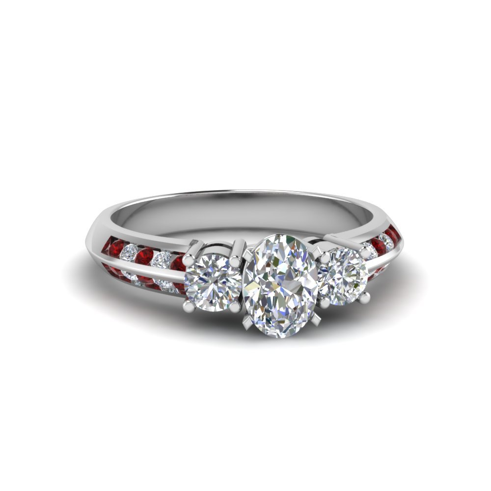 Heart Shaped 3 Stone Channel Accent Diamond Engagement Ring With Ruby